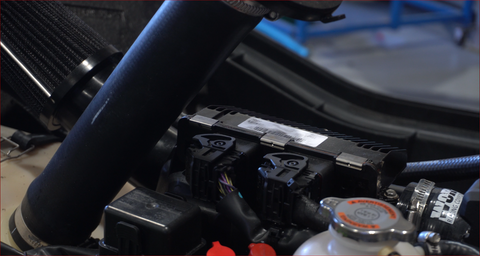 Sea-Doo Spark ECU visible with its connectors, ready to remove for a reflash